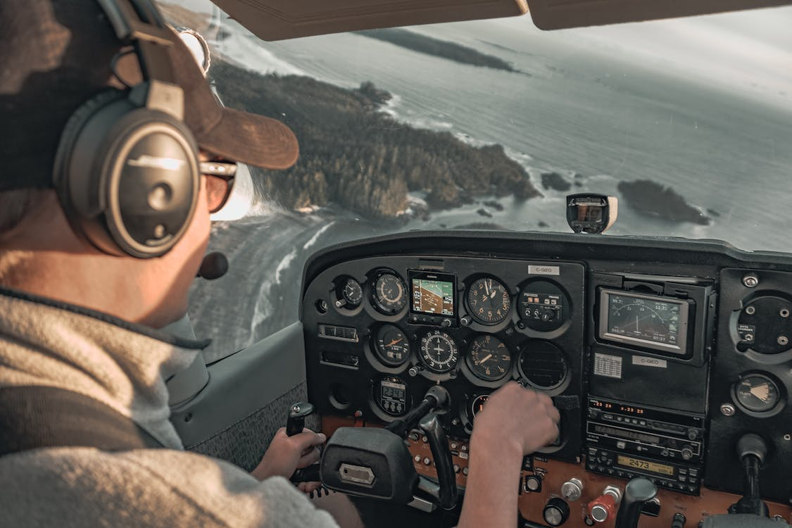pilot navigating in-flight systems   